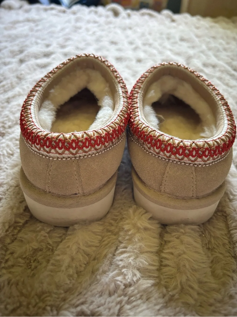 UGG Kids Tan Shearling Slip-On Slippers with Red Trim